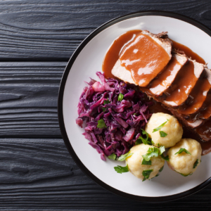 Festive German full dinner Sauerbraten - beef stew with gravy se